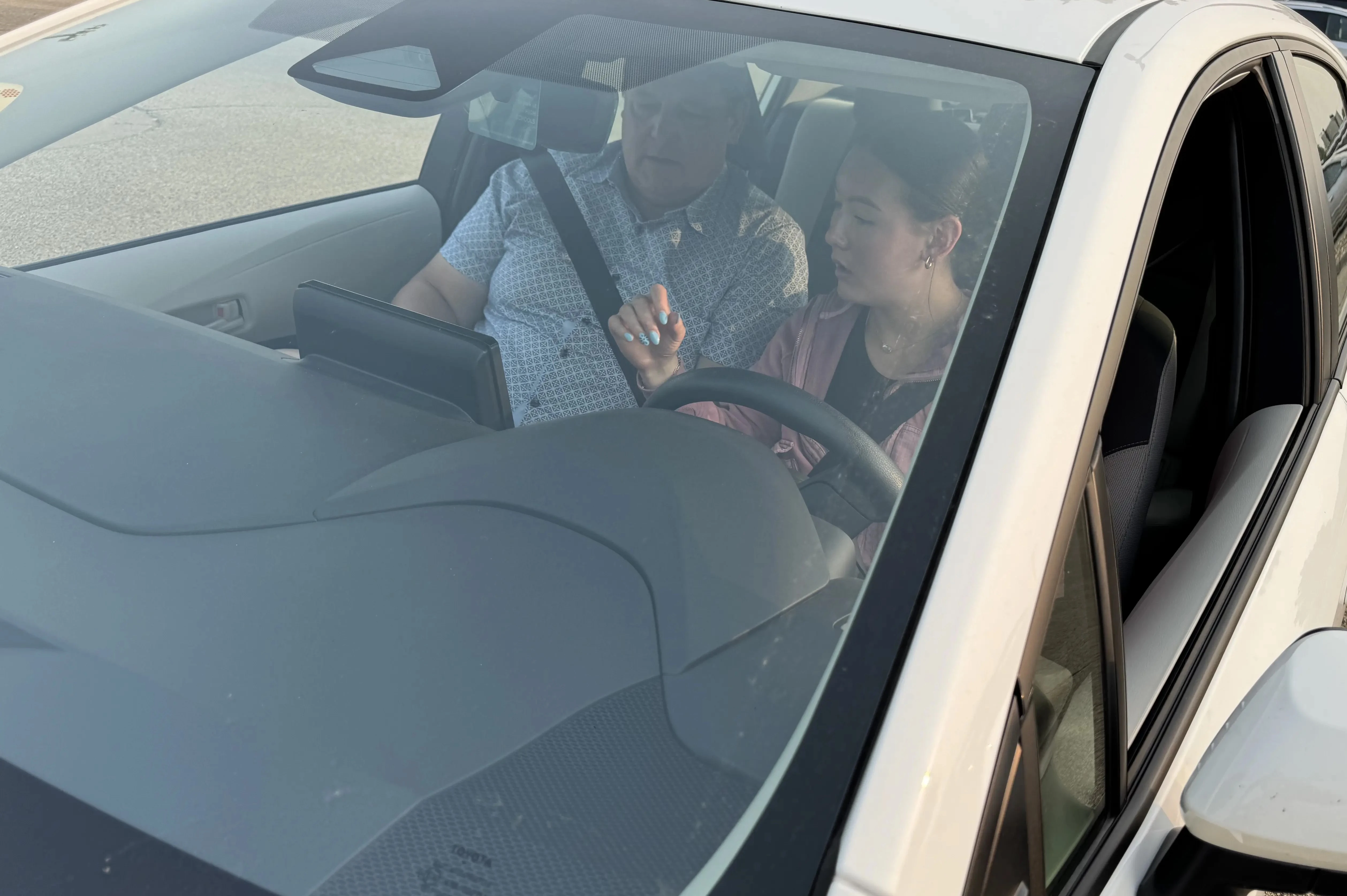 Student and instructor on a driving lesson